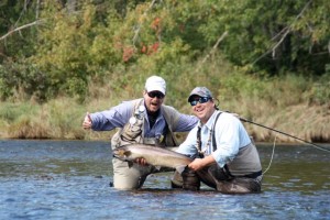 Jay Fargher and guide Andre Anthony from the Ledges in Doaktown, NB on the Main Southwest Miramichi River with a nice MSW salmon