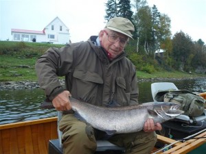 Ledges Inn guest DR. Scott Boley with a 22lb salmon taken on a Green Slime.