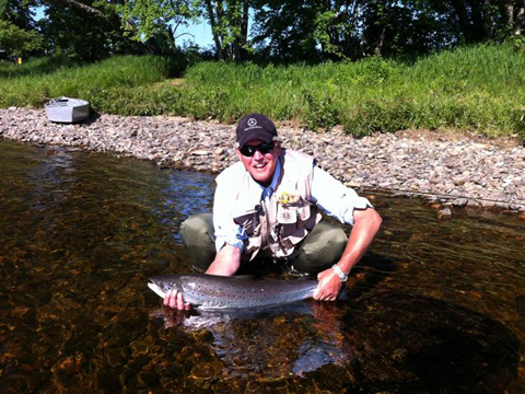 Alan DeWinter with a nice July salmon Alan DeWinter with a nice July salmon