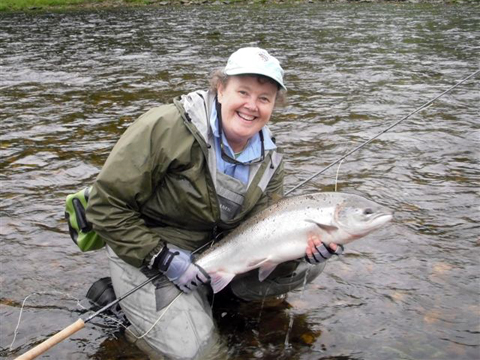 MJ with her first salmon: an 18lb hen. She was one happy lady!