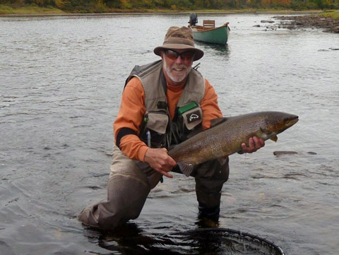 Tom Kleeman with a nice fall salmon taken at Flo's pool with Whittail Green Machine