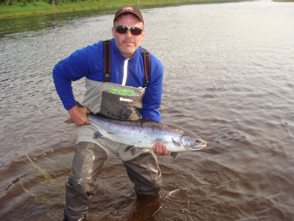 From Kevin Pugh: Here is a pic of Salmon I caught at the Mouth of the Cains River Pool on the morning of Sunday June 23, 2013.  I'm guessing it was in the 25lb range.  Hooked on a Shady Lady.  It was the fifth of six Salmon caught in three days.  A lot of Salmon and very few grilse.