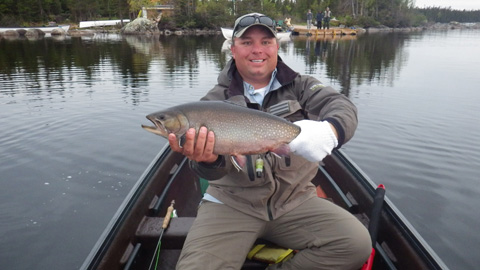 Derek Munn with a trout from Igloo Lake Lodge in Labrador. Awesome trip!