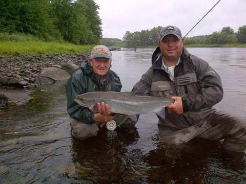 Robert Bell with guide Derek Munn and a nice salmon taken on a shady lady.