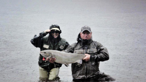 Barbara McGuire with her fourth fish of the (rainy!) day - a 27 lb hen taken on a shady lady