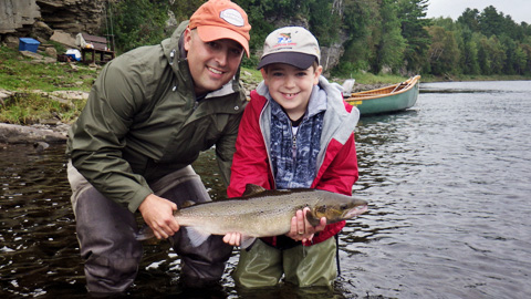 Joe and Aiden Palmer with a nice salmon taken on a White-Tailed Green Machine.